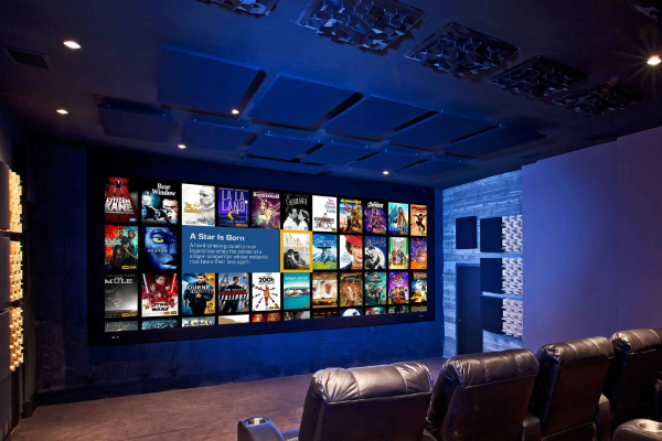 Family watching ColaBox setup on a living room TV